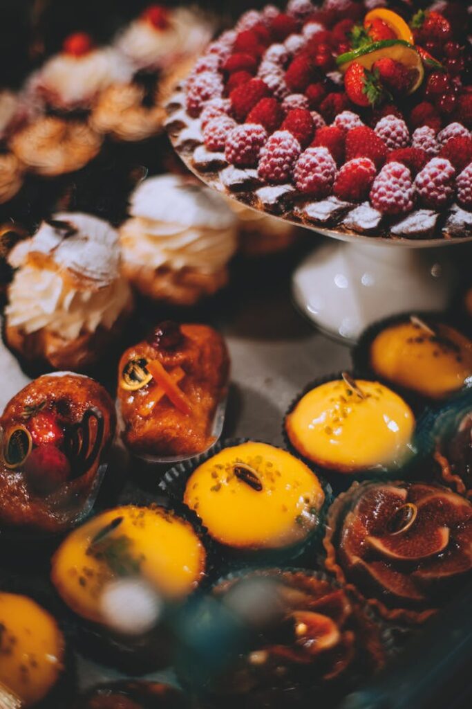 Tasty sweet pastry with raspberry decorated with sugar powder